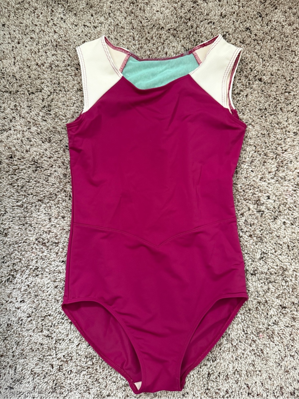 Adult small Tiger Friday Leo. Magenta with Cream and light blue.